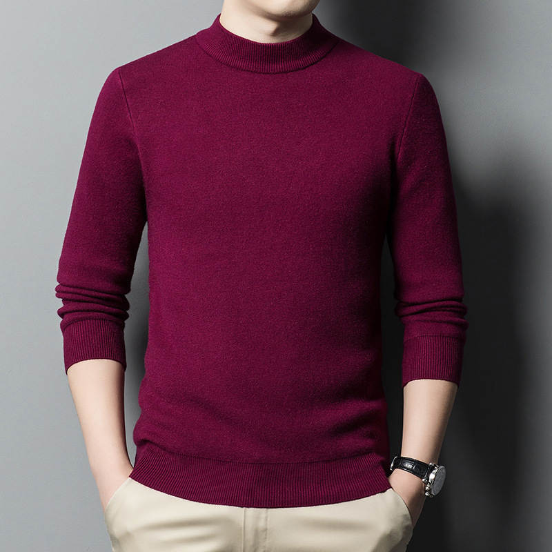 The Mock Neck Sweater in Burgundy, worn