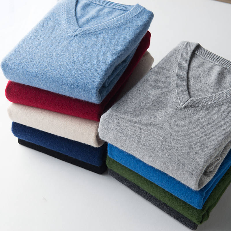 The V-Neck Knit, folded, in several colours